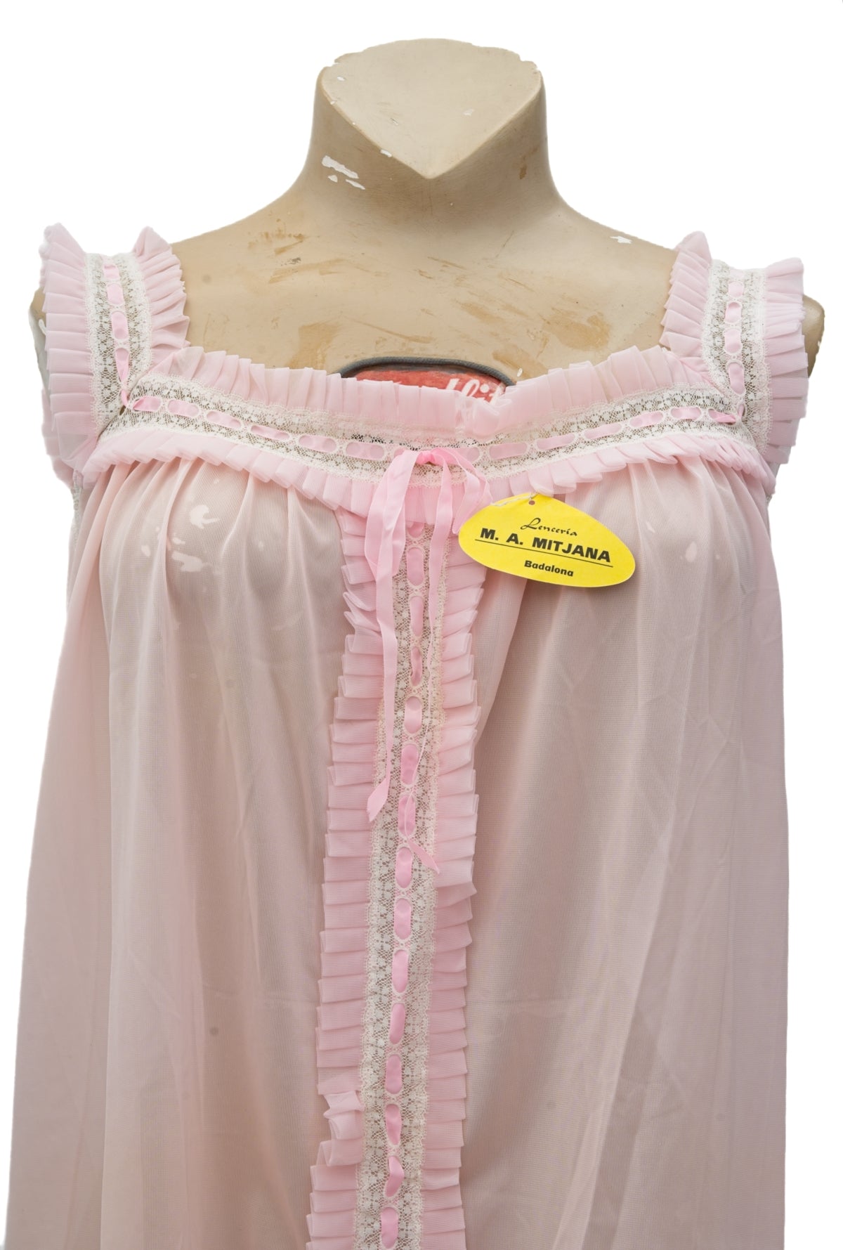 Pink nightgown on a mannequin with a visible brand tag.