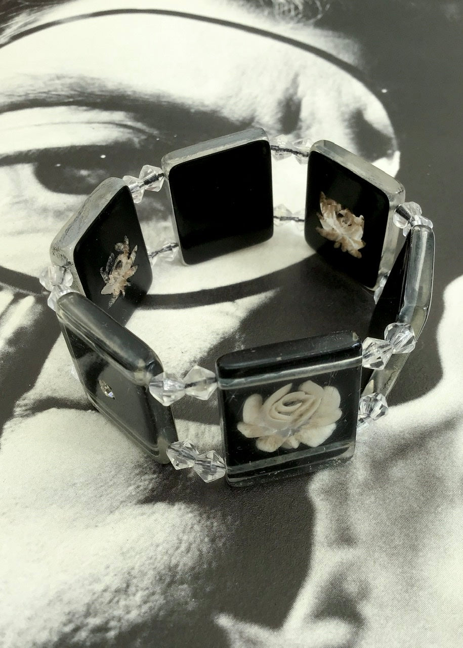 vintage reverse carved lucite bracelet with rose design and rhinestones
