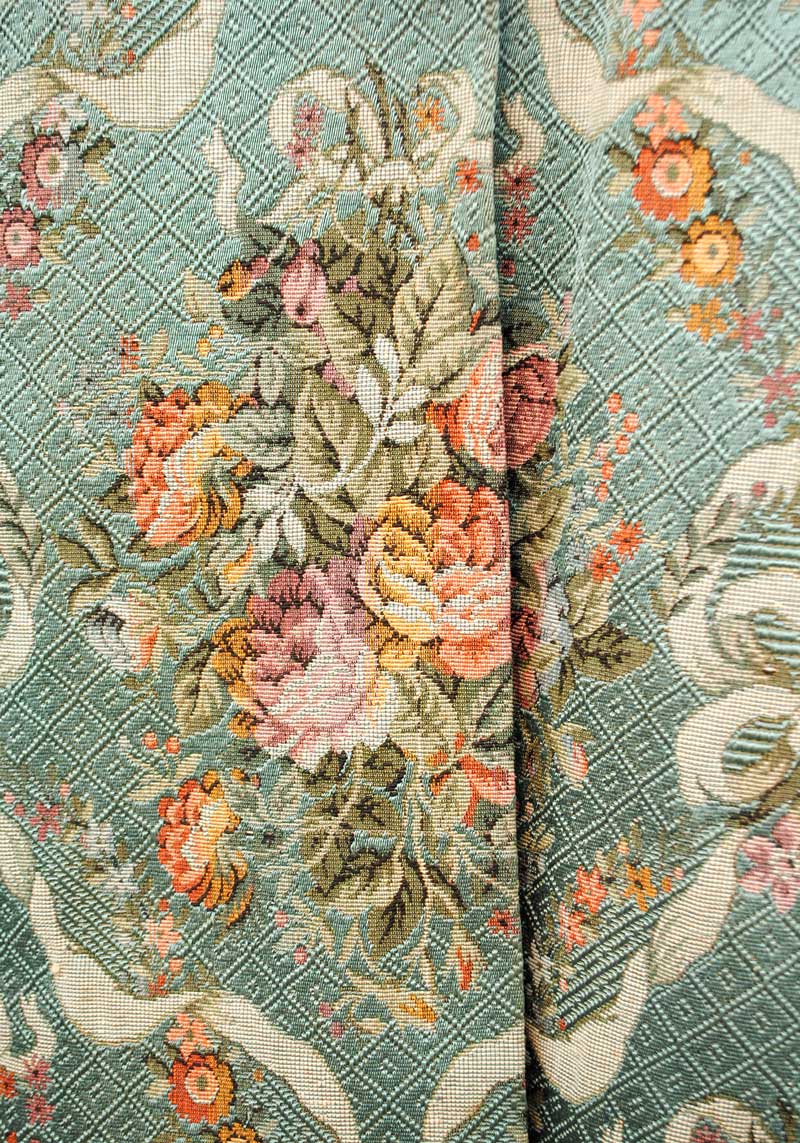 blue tapestry with roses and swags