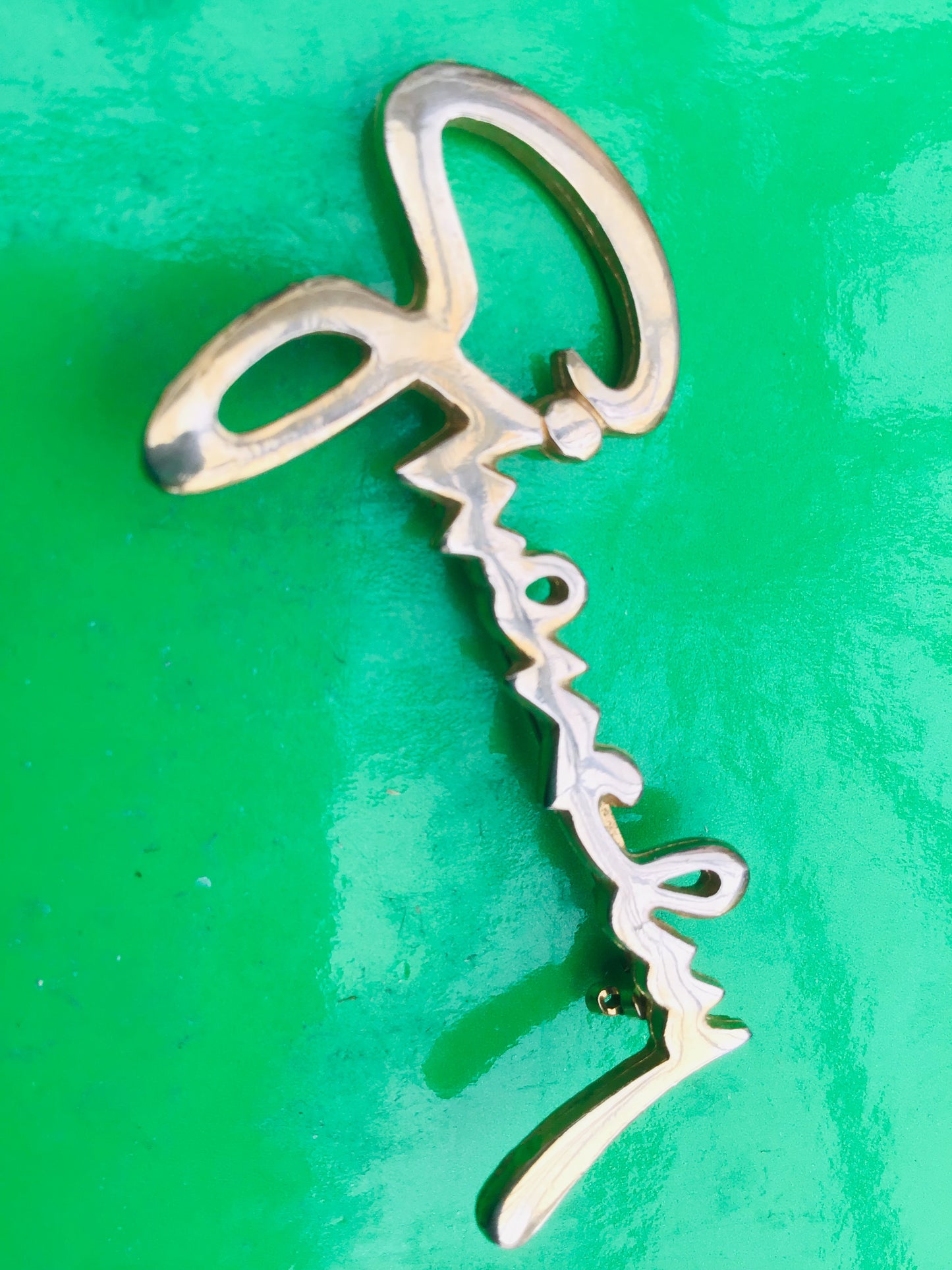 Vintage givenchy brooch spelling out the name of the designer, rare and collectible brooch
