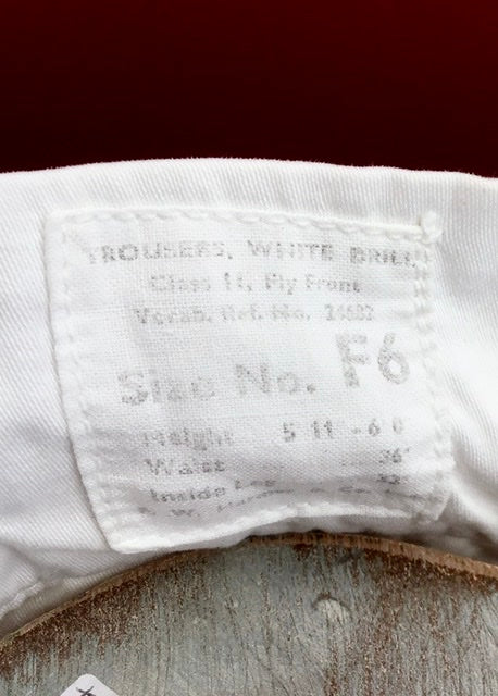 Royal navy white drill trousers. Class 11, fly front. To fit height 5’11”-6’, waist 36, leg 32”.