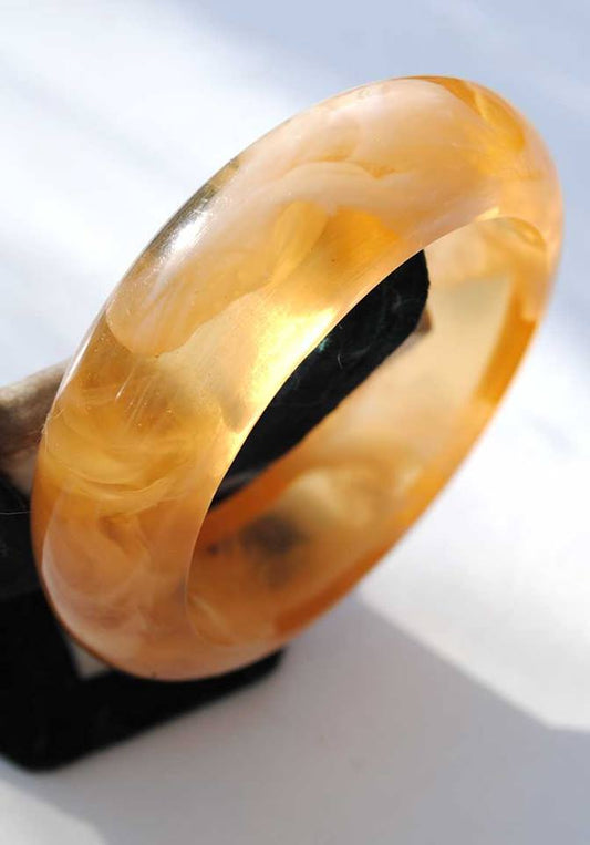 Shiny domed apricot swirl rockabilly bangle