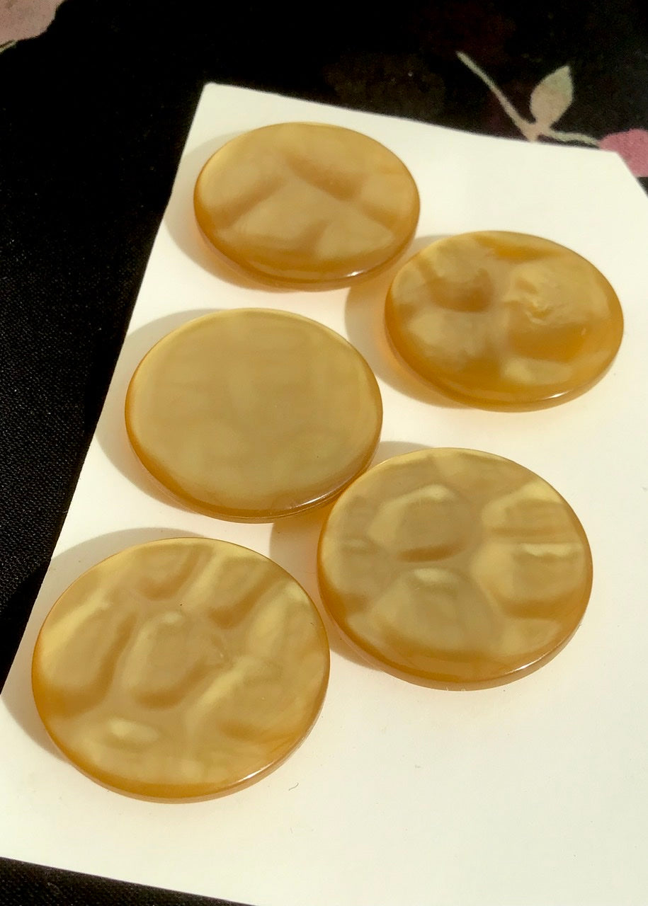 a set of 5 dappled texture amber coloured plastic vintage buttons for dressmaking