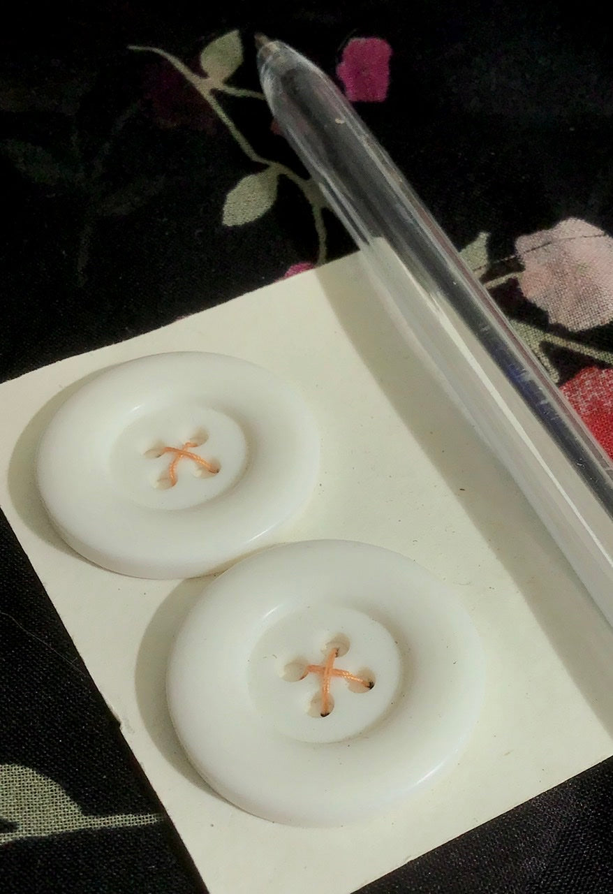 Two Rounded Bevel White Plastic Vintage Buttons