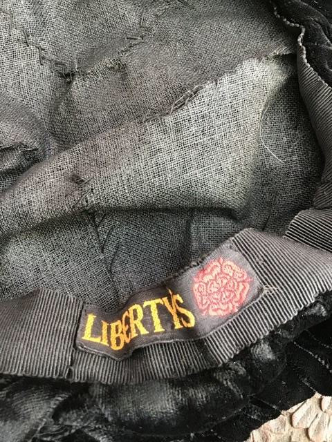 antique 1900s liberty’s hat label with tudor rose