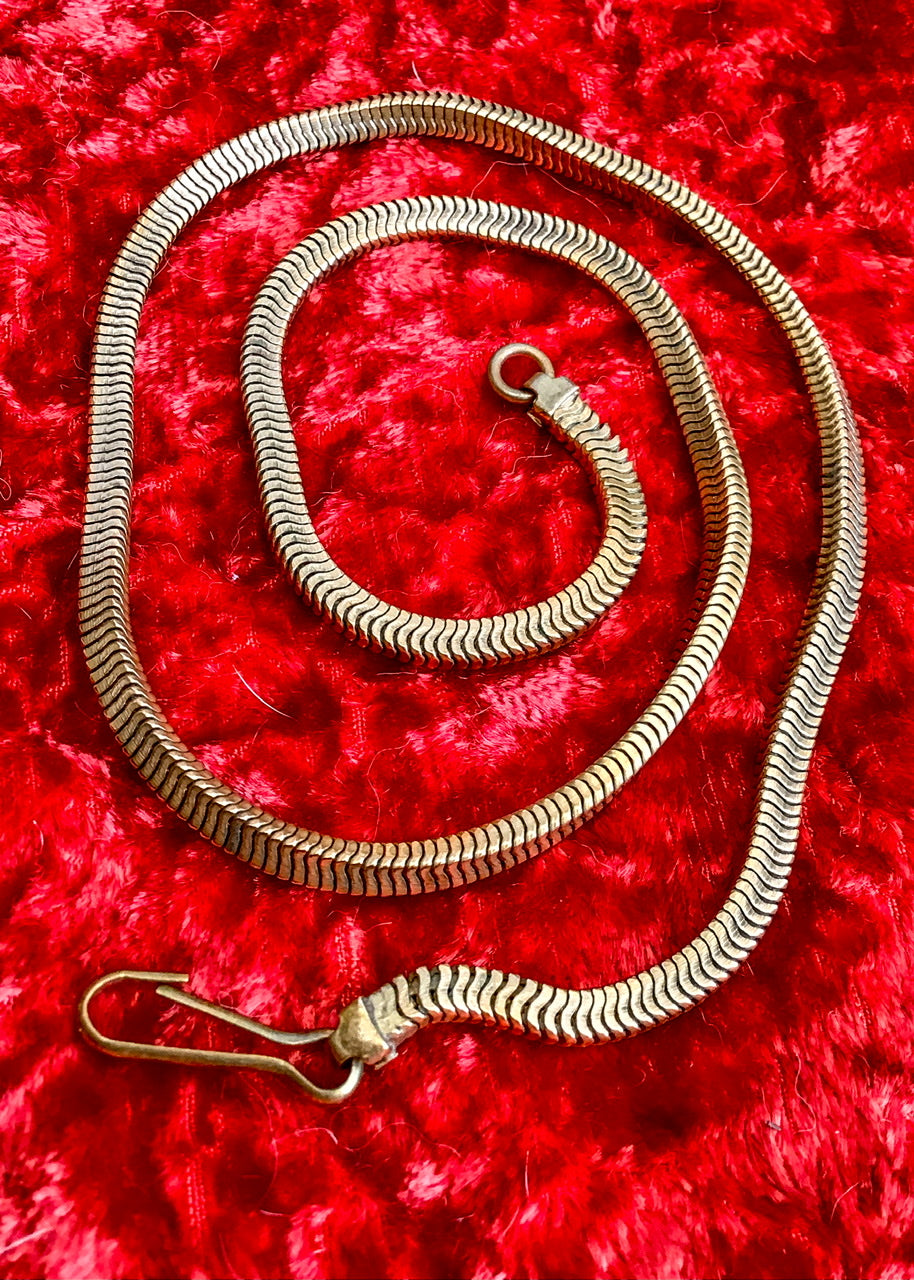 vintage 30s brass albert chain for a pocket watch, in a square shape snake chain.