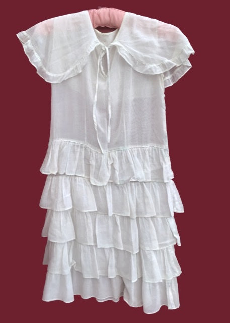 antique white cotton voile teens dress with cape and ruffle frills.