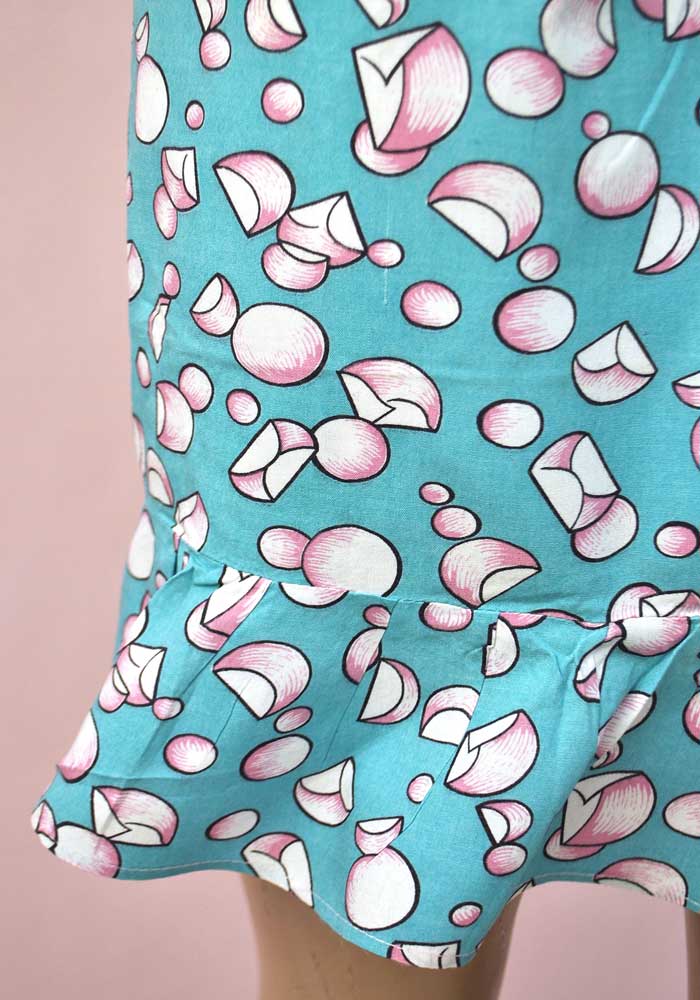 Frilly 50s apron with turquoise atomic kitsch printed cotton