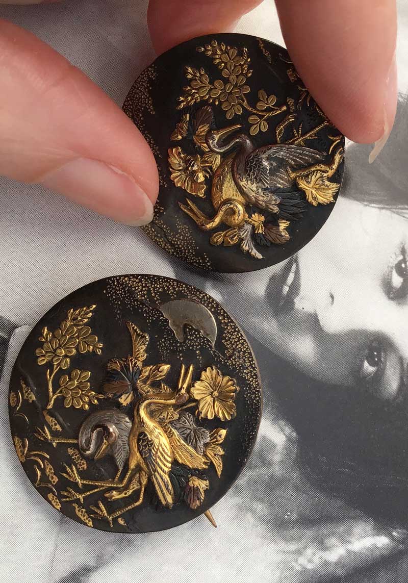 highly collectible shakudo buttons depicting cranes for a happy marriage