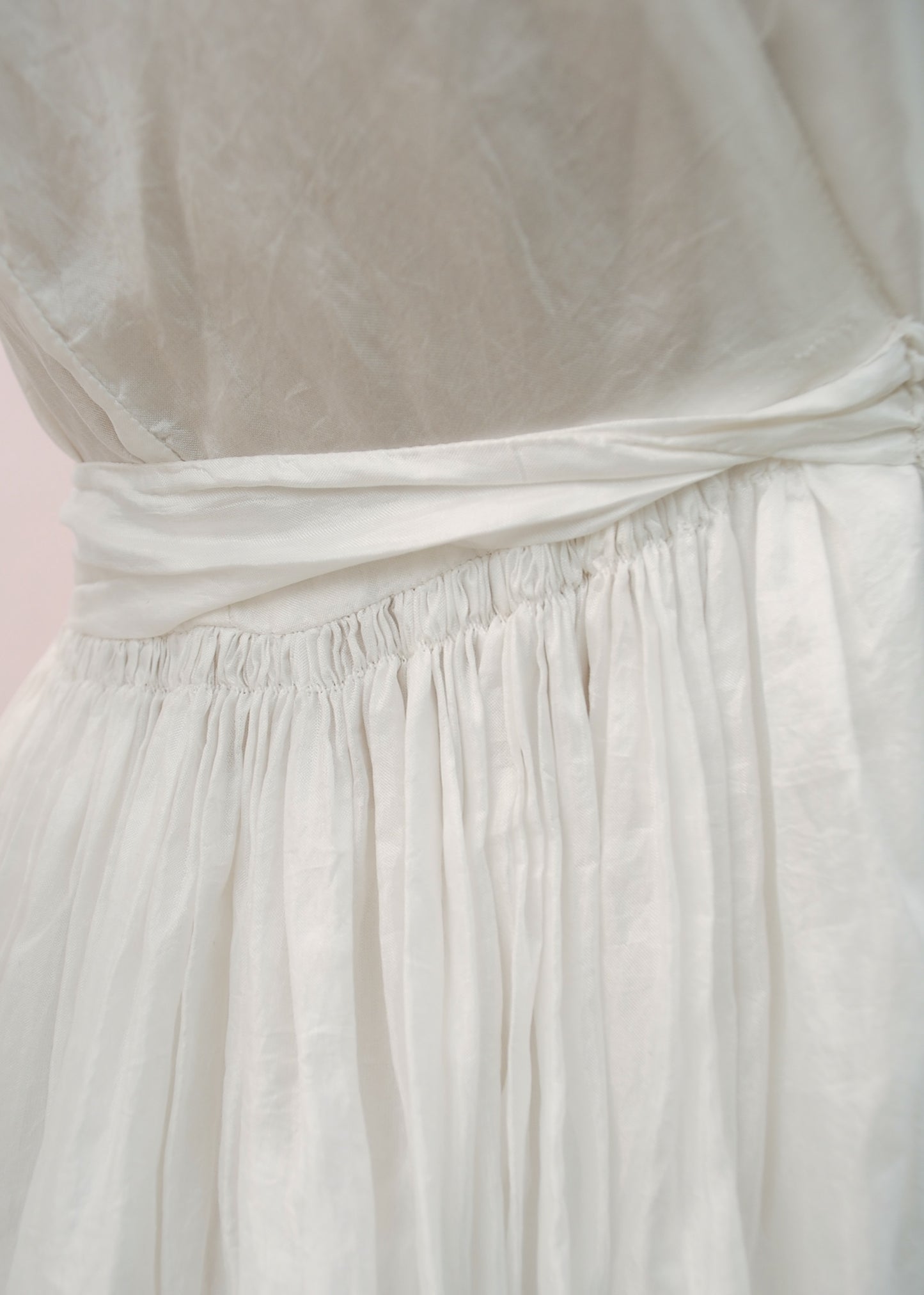 hand stitched gathering on this exquisite vintage white silk robe