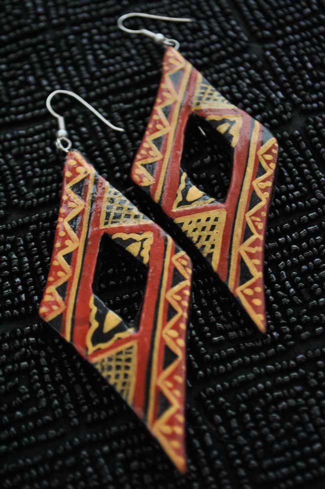 large statement 80a paper mache earrings hand painted in ethnic geometrical pattern on golden tones and rusty red paint. For pierced ears.