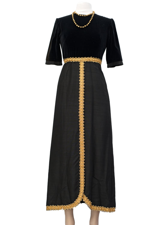 wonderful vintage black and gold cocktail evening dress by john charles with short sleeves, tulip skirt it is velvet and raw silk with gold braid to fir a small 24 waist