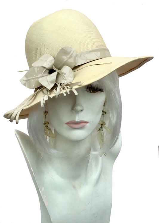 Designer phillip somerville summer hat with beige vinyl flower and fringe decoration, 1960s, 70s vintage summer hat