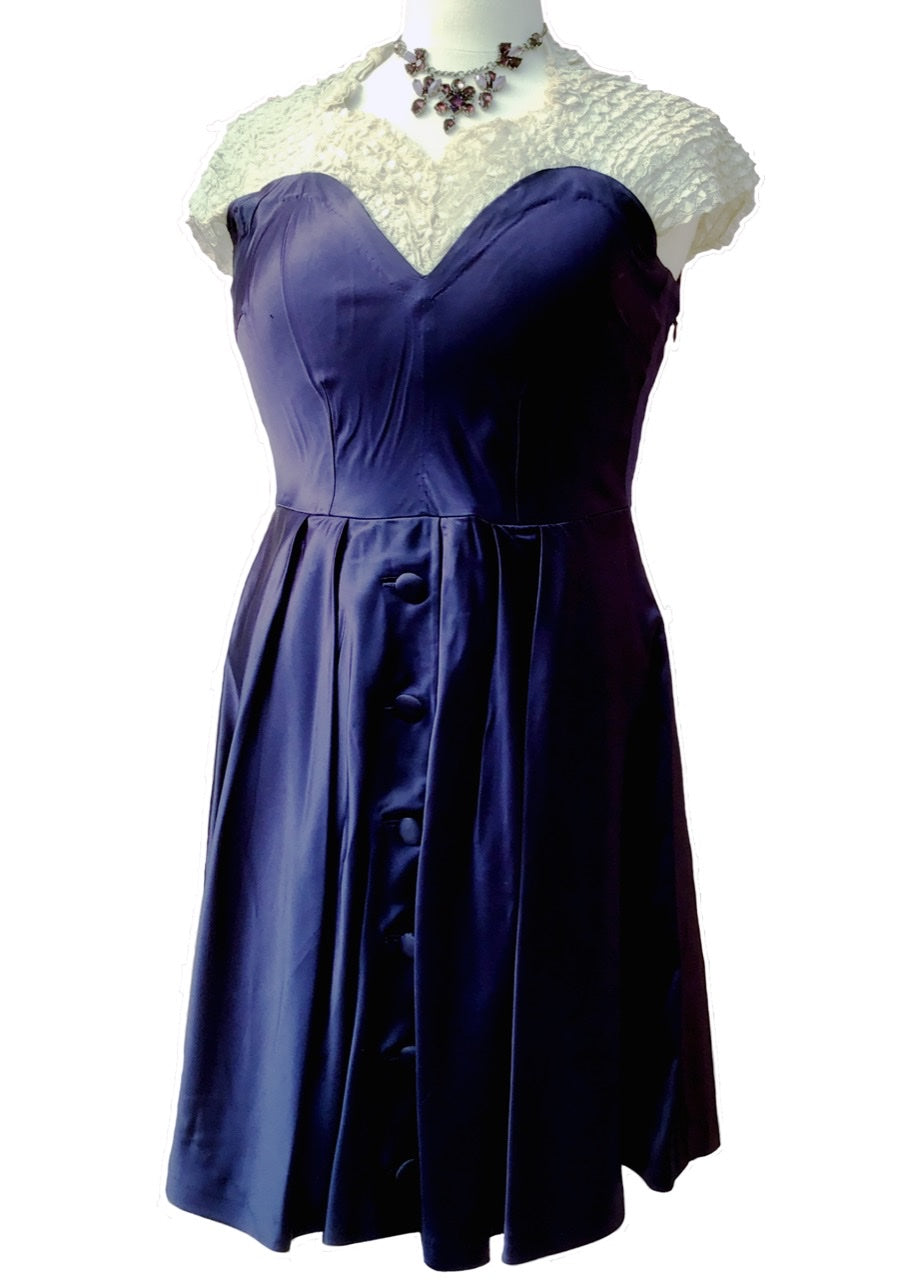 original vintage dress repurposed in the 1950s to a fit and flare style from an original 1930s blue satin gown