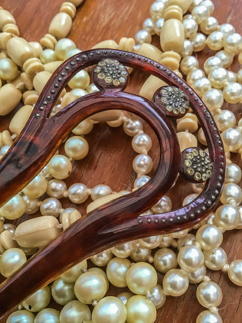 edwardian hair comb decorated with florettes of diaminte and silver studs