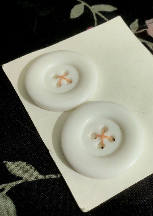 Two Rounded Bevel White Plastic Vintage Buttons