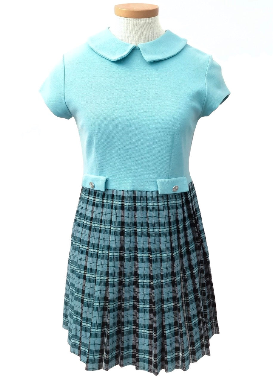 tween girl’s vintage turquoise blue kilted dress with short sleeves and peter pan collar. Made by Judy in courtelle wool knit fabric.