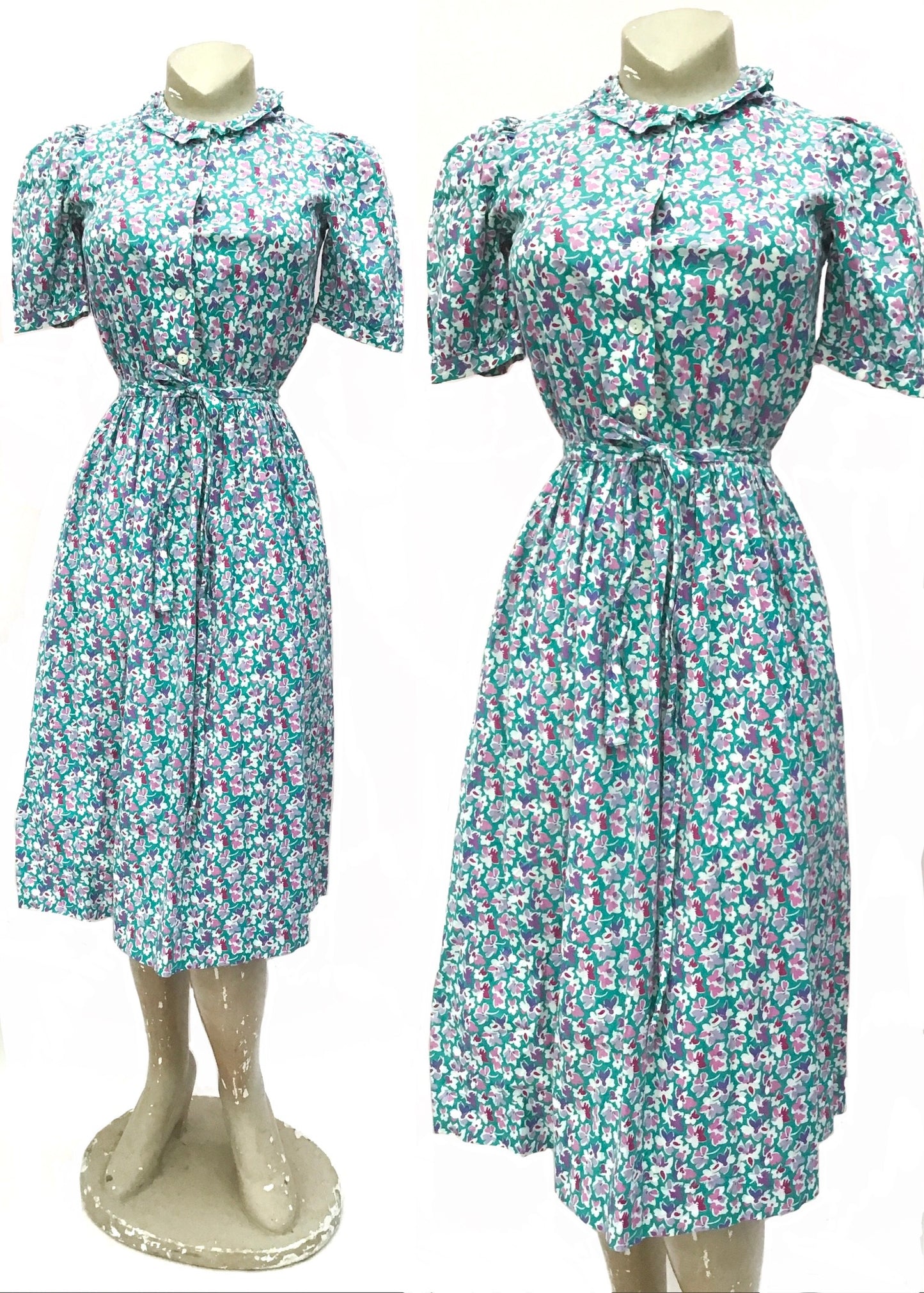 1940s style vintage 70s turquoise and lilac cotton sundress with short puffed sleeves and cinched waist. With pretty violet flowers and pansies.