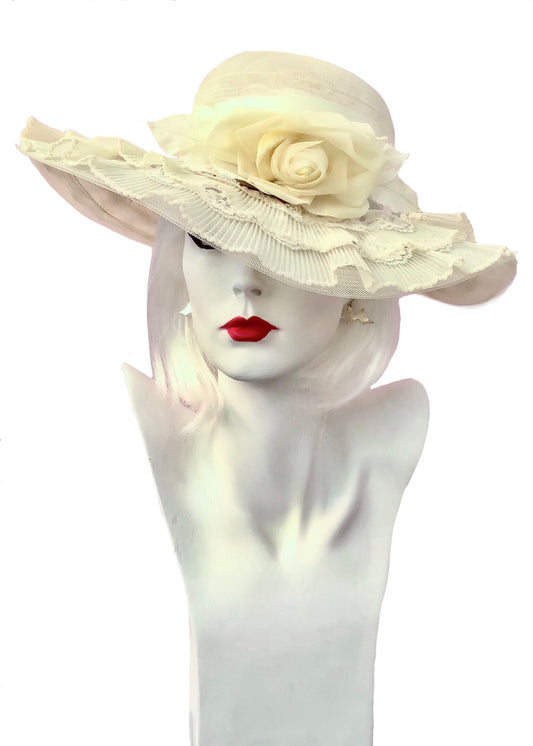 Vintage primrose yellow frilly floppy summer hat, with pastel pale yellow rose and layers of creamy lace ruffles, perfect for a walk in the park