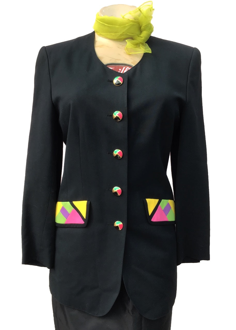 vintage 90s black longline louis feraud blazer perfect for spring officewear, it comes with a brightly coloured blouse with matching accents to the pocket flaps and enamel buttons. The bright spring like colours of lime green, yellow and purple pop out of the black of the jacket .
