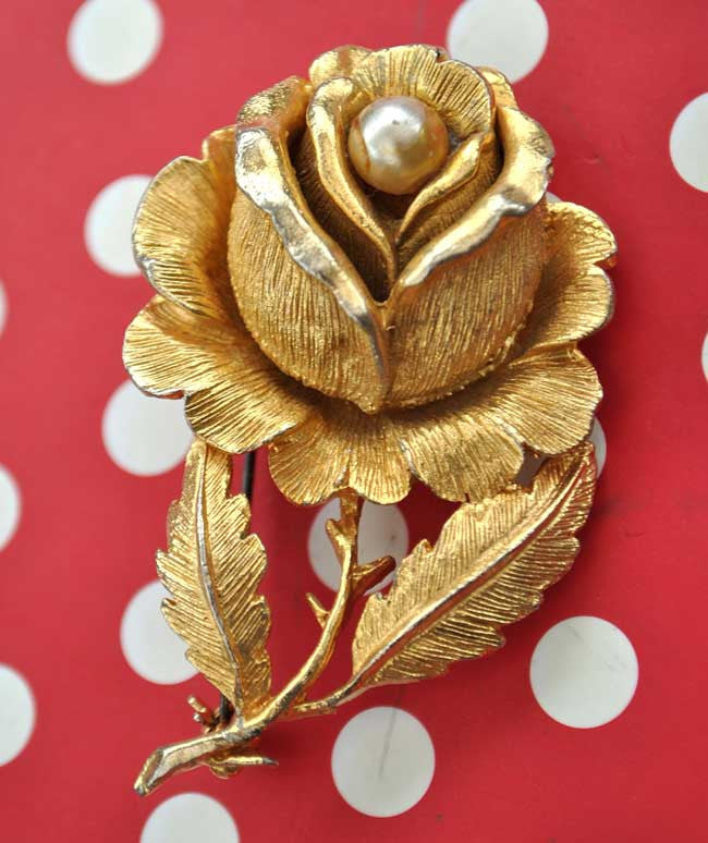 vintage rose with pearl brooch